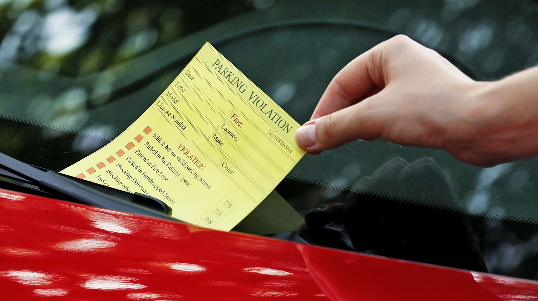 Parking Violation on windshield of a car