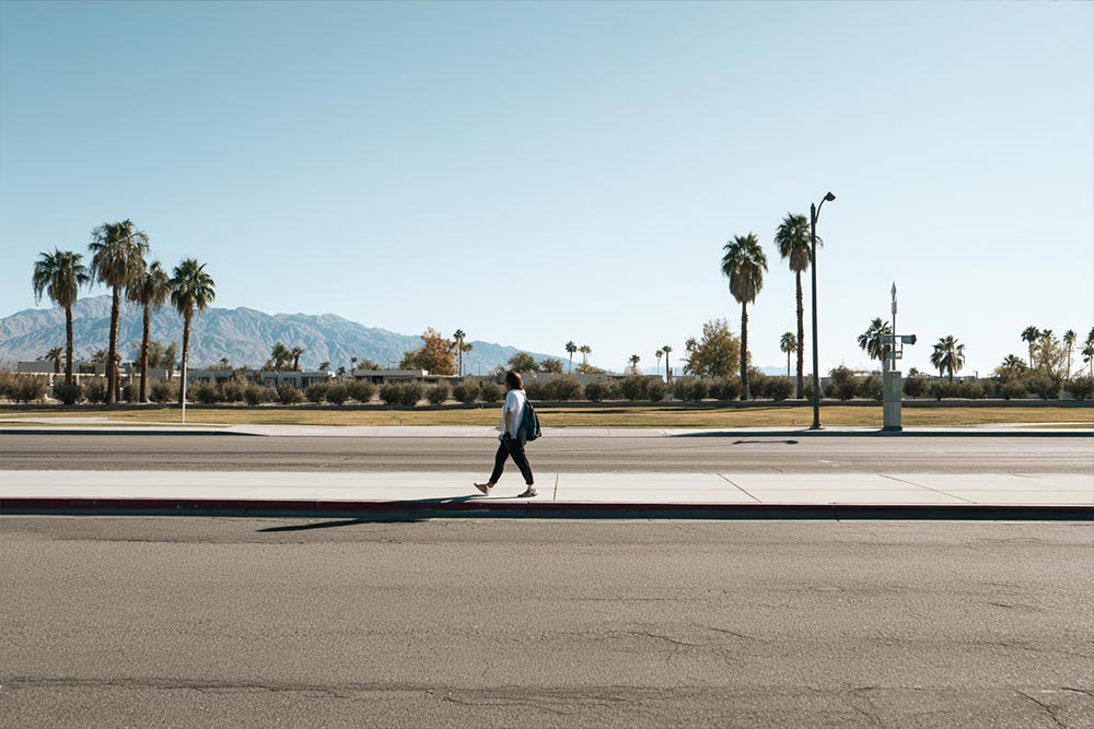 woman walking down street