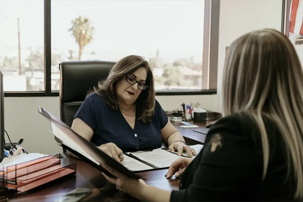 DA reviews case with victim